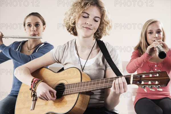 Teenagers making music together