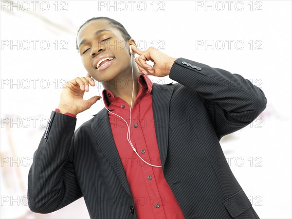 Young man listening to music