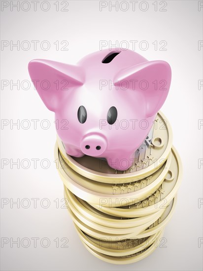 Piggy bank on a pile of euro coins