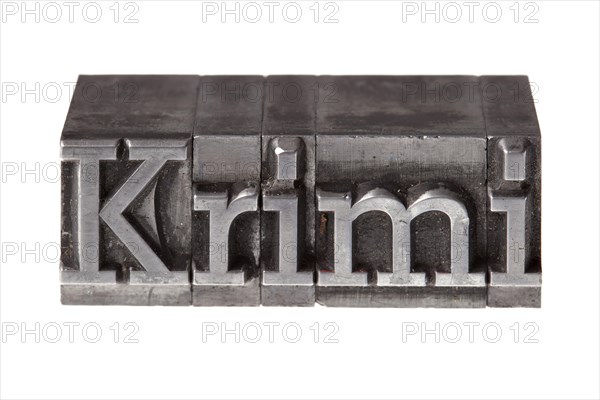 Old lead letters forming the word 'Krimi'