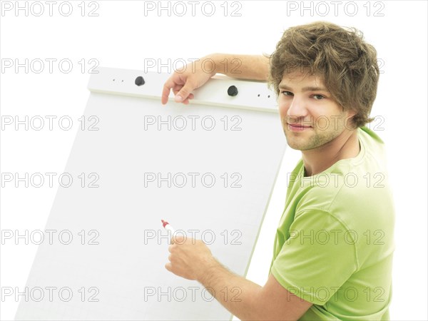 Man standing in front of a flip chart