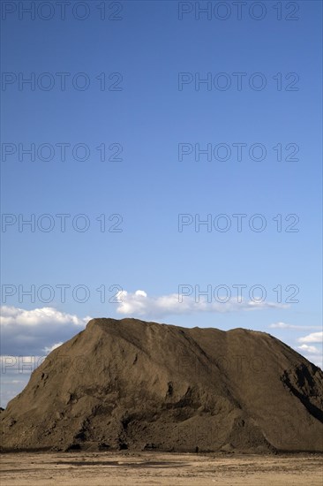 Mound of topsoil in a commercial sandpit