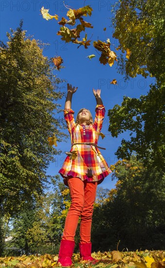 10-year-old girl enjoying the sunny autumn weather
