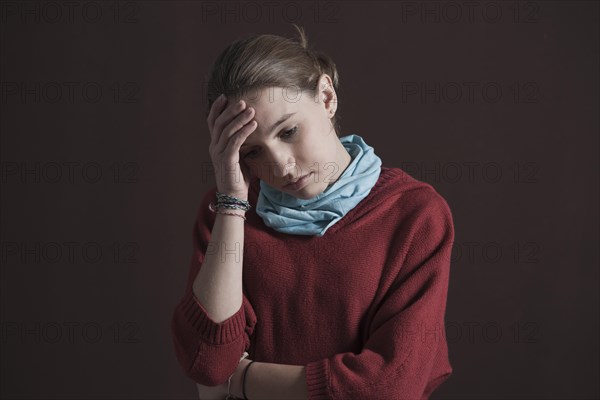 Teenage girl with a thoughtful expression