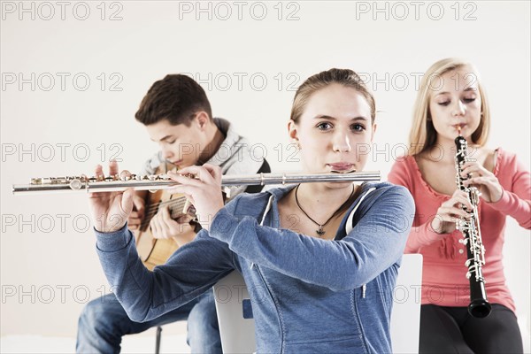 Teenagers making music together