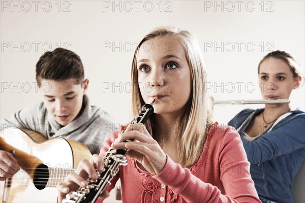 Teenagers making music together