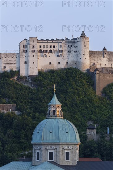 Hohensalzburg Castle and the dome of Salzburg Cathedral as seen from Kapuzinerberg mountain