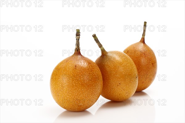Three Granadillas or Passion Fruit (Passiflora caerulea)