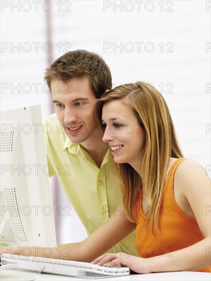 Young couple using a computer