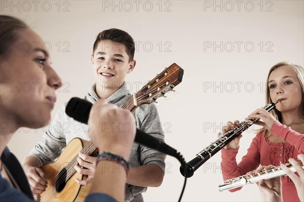 Teenagers making music together