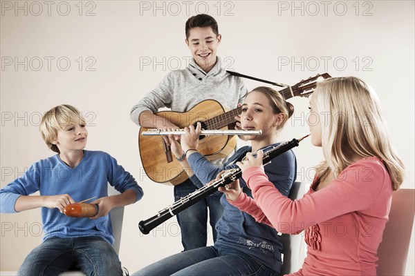 Teenagers making music together