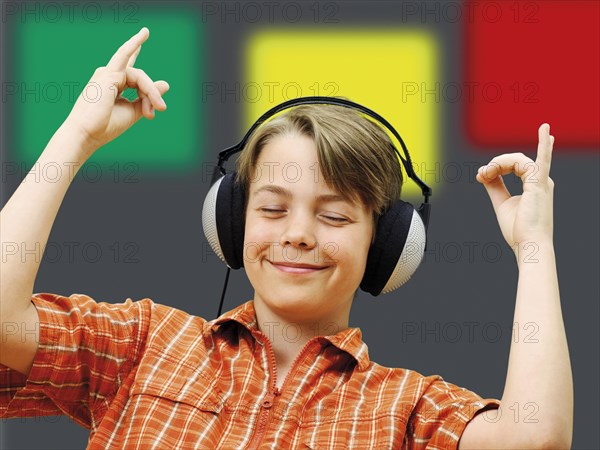 Boy listening to music with headphones