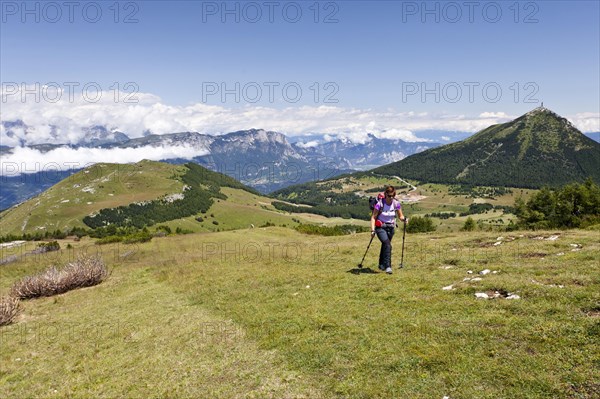 Hiker climbing Cornet mountain