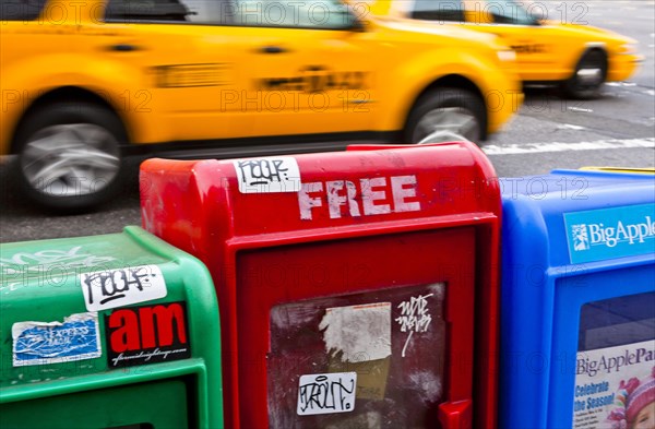 Newspaper vending machines on the roadside