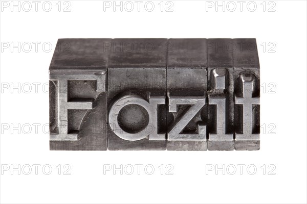 Old lead letters forming the word 'Fazit'