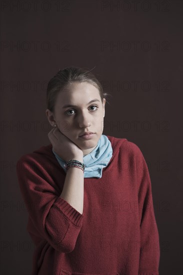 Teenage girl with a thoughtful expression