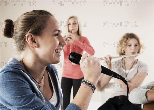 Teenagers making music together