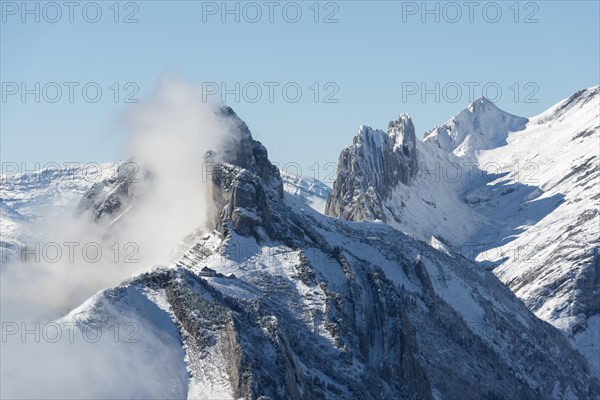 A cloud hanging next to Staubernkanzel mountain