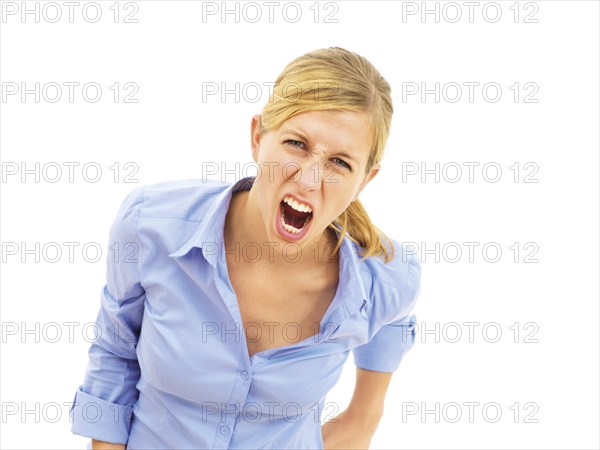 Young woman screaming