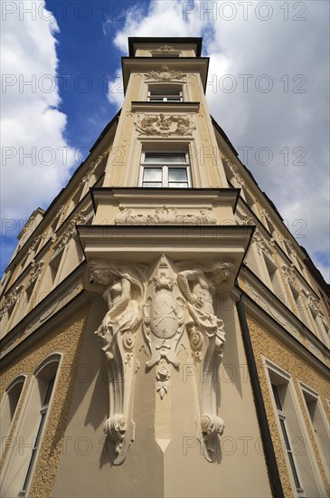 Multi-storey bay windows of an Art Nouveau building with caryatids