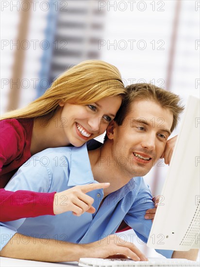 Young couple using a computer