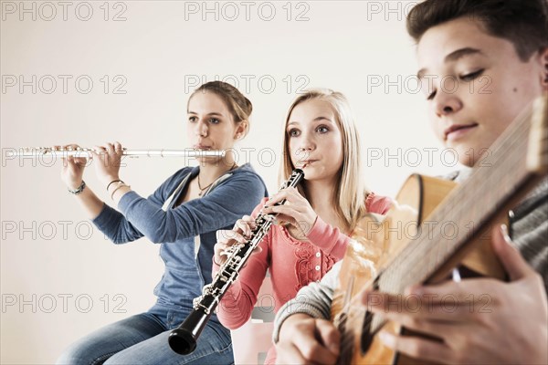 Teenagers making music together