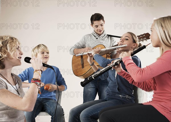 Teenagers making music together