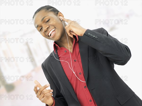 Young man listening to music