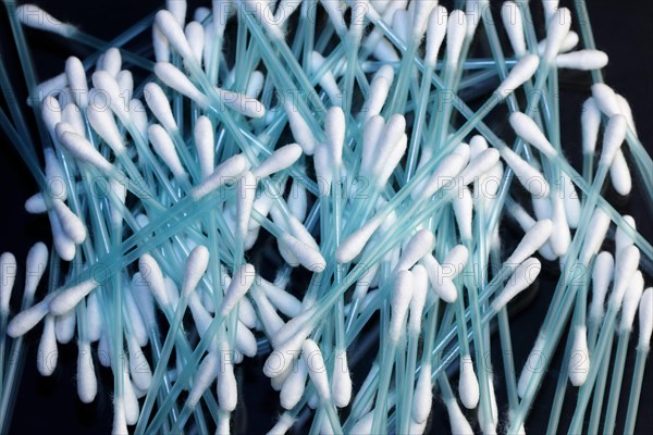 Cotton swab with plastic