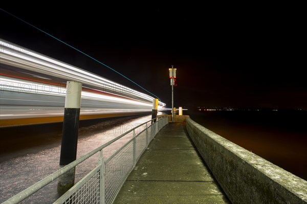 Ferry port in Konstanz Staad light traces of a moving ferry