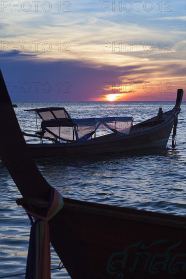 Boats at sunset from sunset beach on Ko Lipe