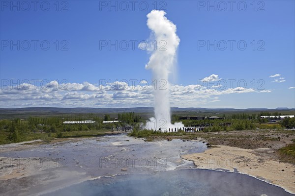 Hot water pool and erupting Strokkur Geysir