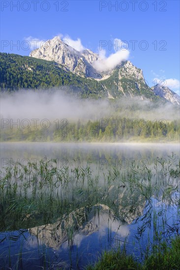 Lake Ferchensee and Wettersteinspitze with early fog