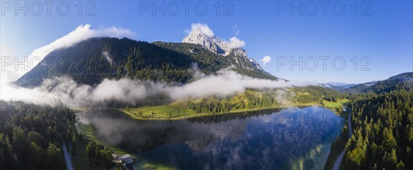 Lake Ferchensee with Grunkopf and Wettersteinspitze in early fog