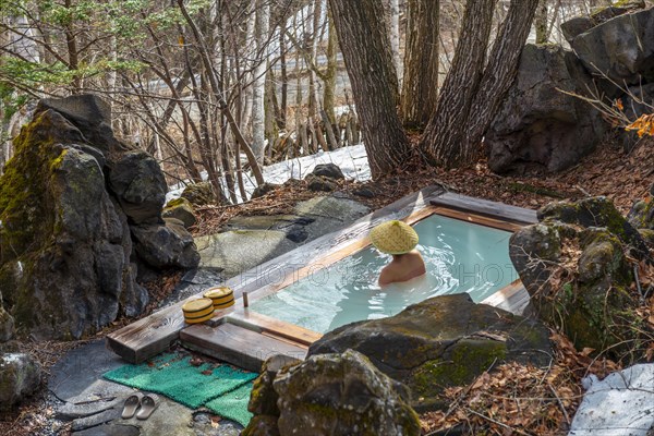 Woman bathing in an onsen