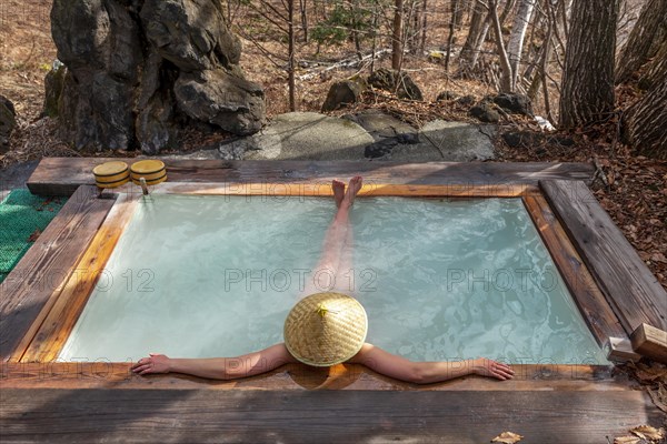 Woman bathing in an onsen