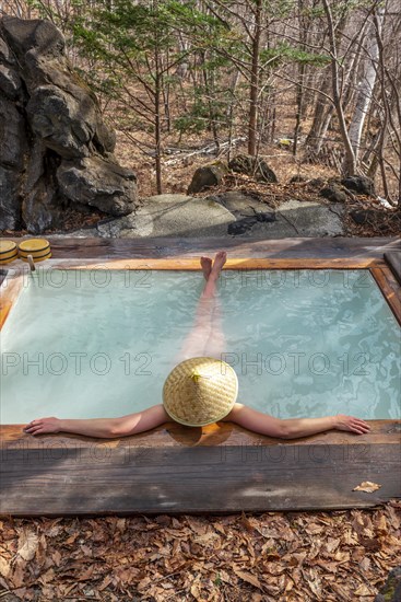 Woman bathing in an onsen