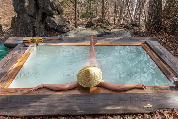 Woman bathing in an onsen