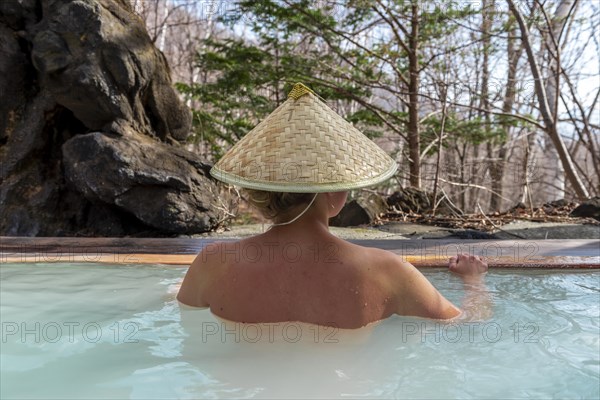 Woman bathing in an onsen