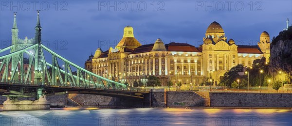 Gellertbad with Freedom Bridge illuminated