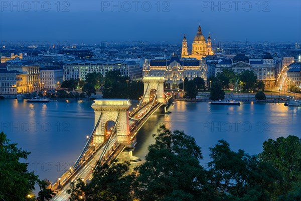 Chain bridge with Gresham Palace and St. Stephen's Basilica