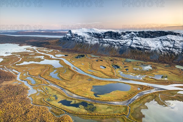 View from mountain Skierffe to the autumnal river delta Rapadalen