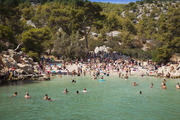 Beach vacationers at the beach in the bay Calanque de Port-Pin