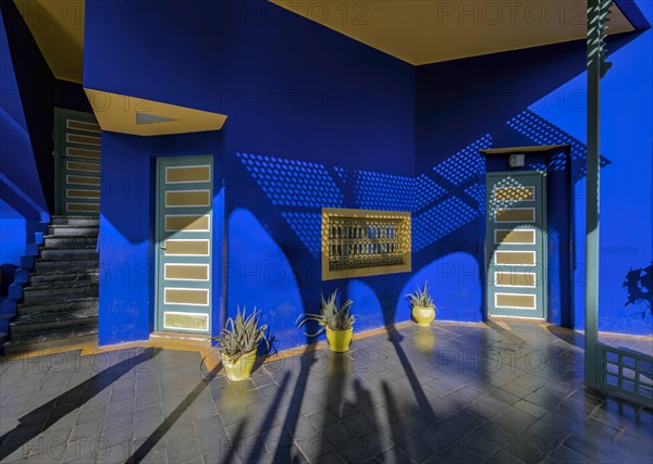 Blue house in the botanical garden Jardin Majorelle