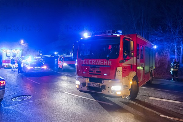 Fire engine closes the road in the event of a traffic accident