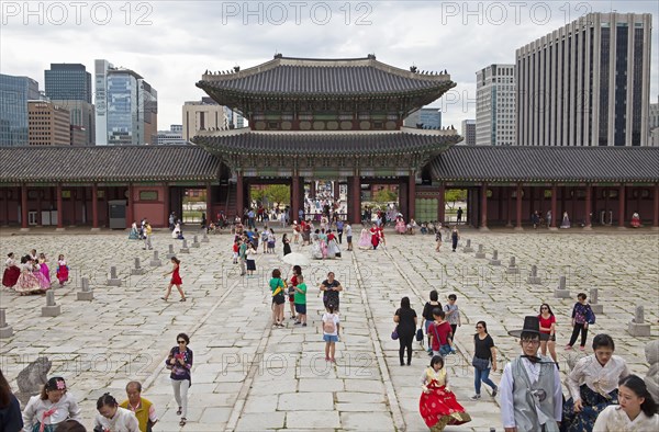 Visitors in traditional clothing in the Royal Palace Gyeongbokgung