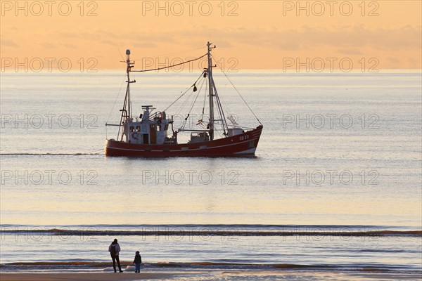 Fishing boat on fishing trip in the evening light