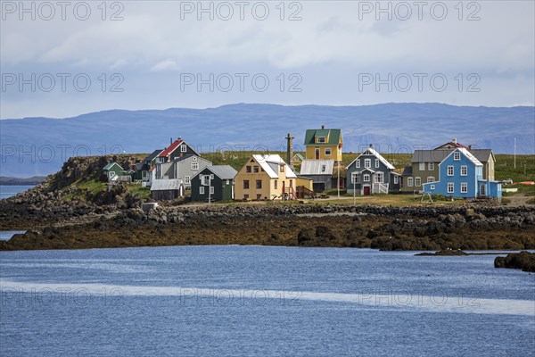 Colourful wooden houses on Flatey Island between Brjanslaekur and Stykkisholmur