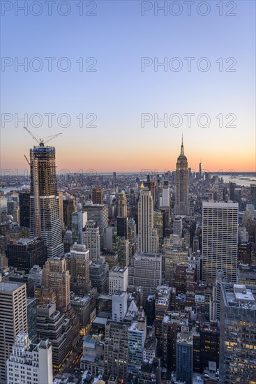 View of Midtown and Downtown Manhattan and Empire State Building from Top of the Rock Observation Center at sunset