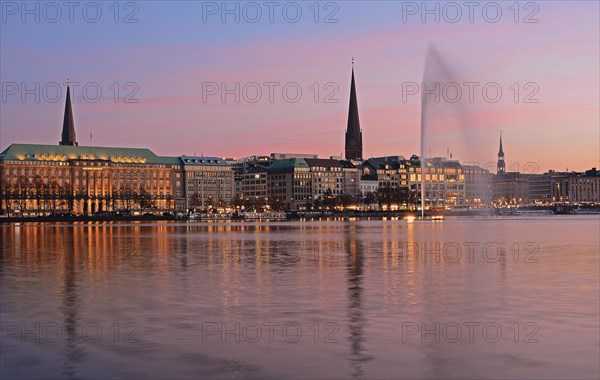 Inner Alster Lake with Alster fountain at dusk